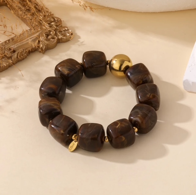 Bracelet en grosses perles marron